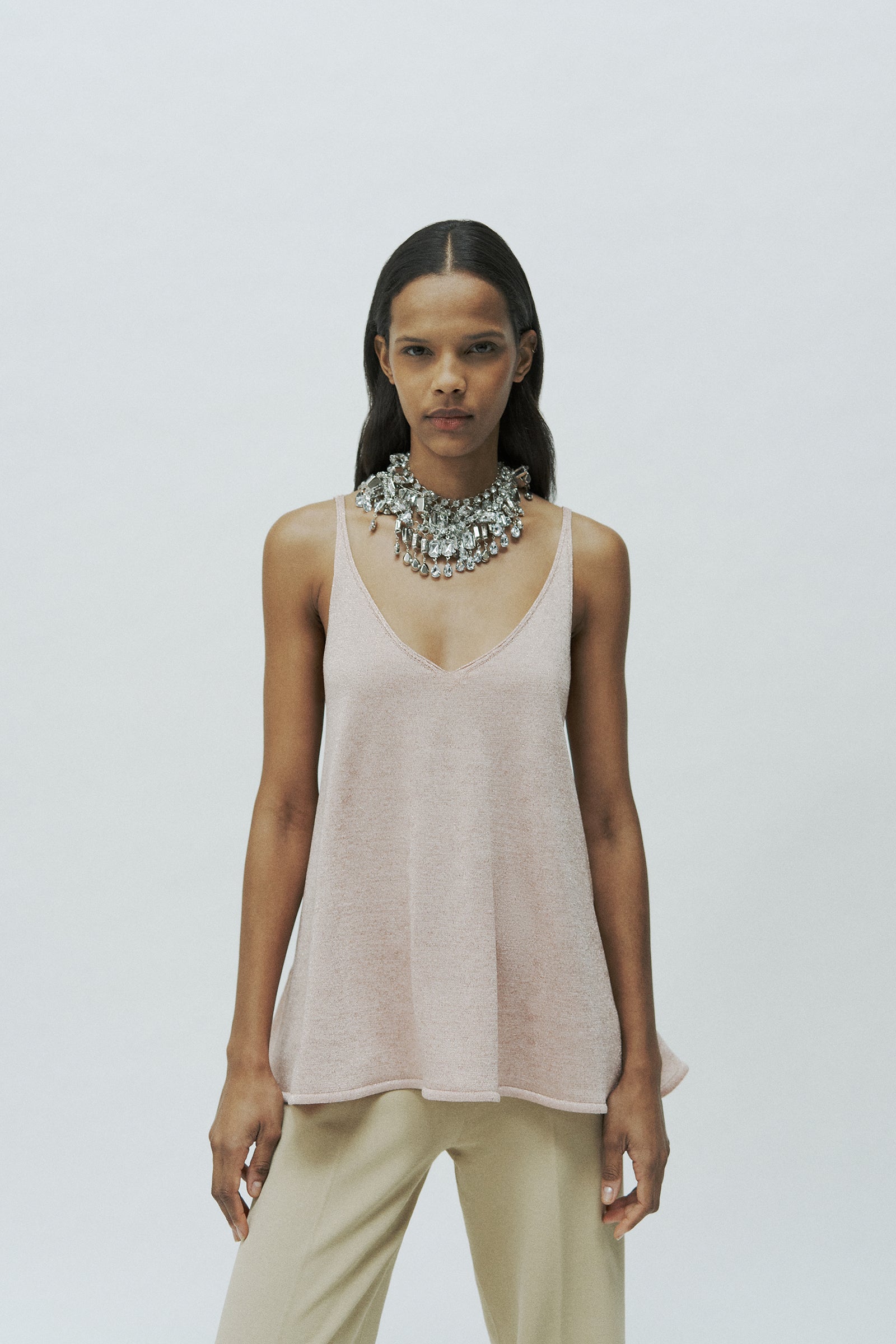 TANK TOP WITH FLARED DETAIL