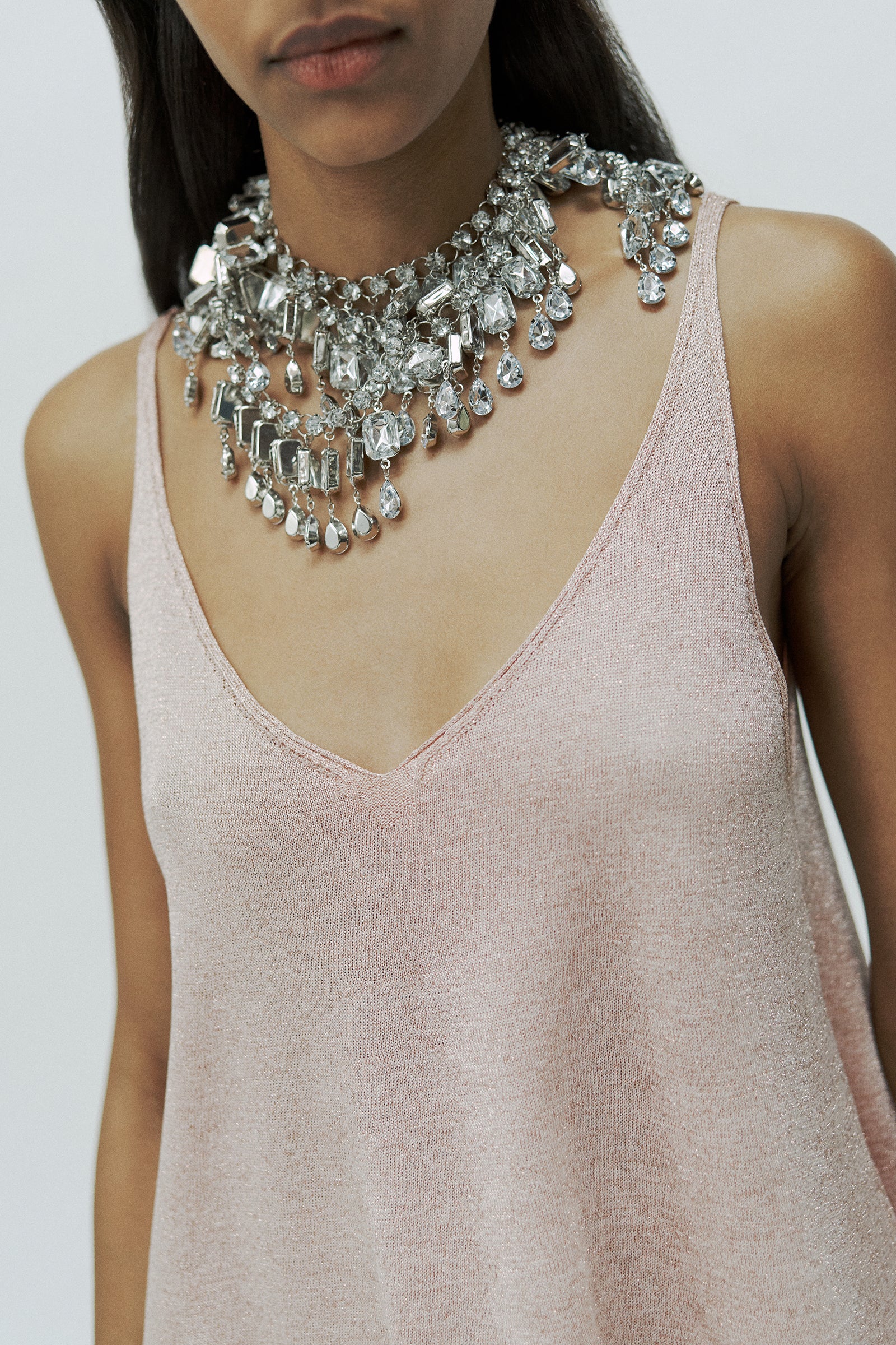 TANK TOP WITH FLARED DETAIL