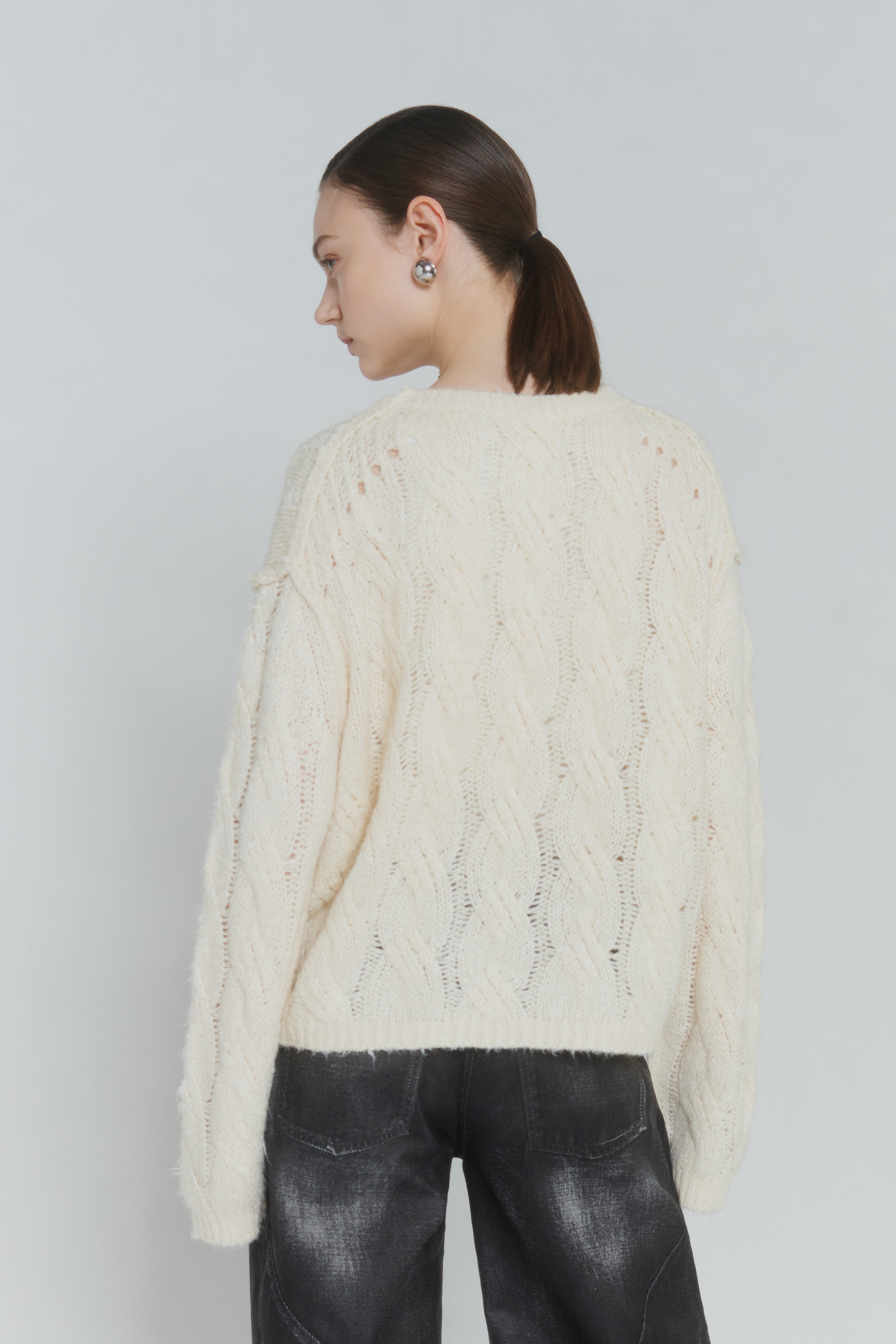 MAGLIA-LAVORAZIONE-A-TRECCE